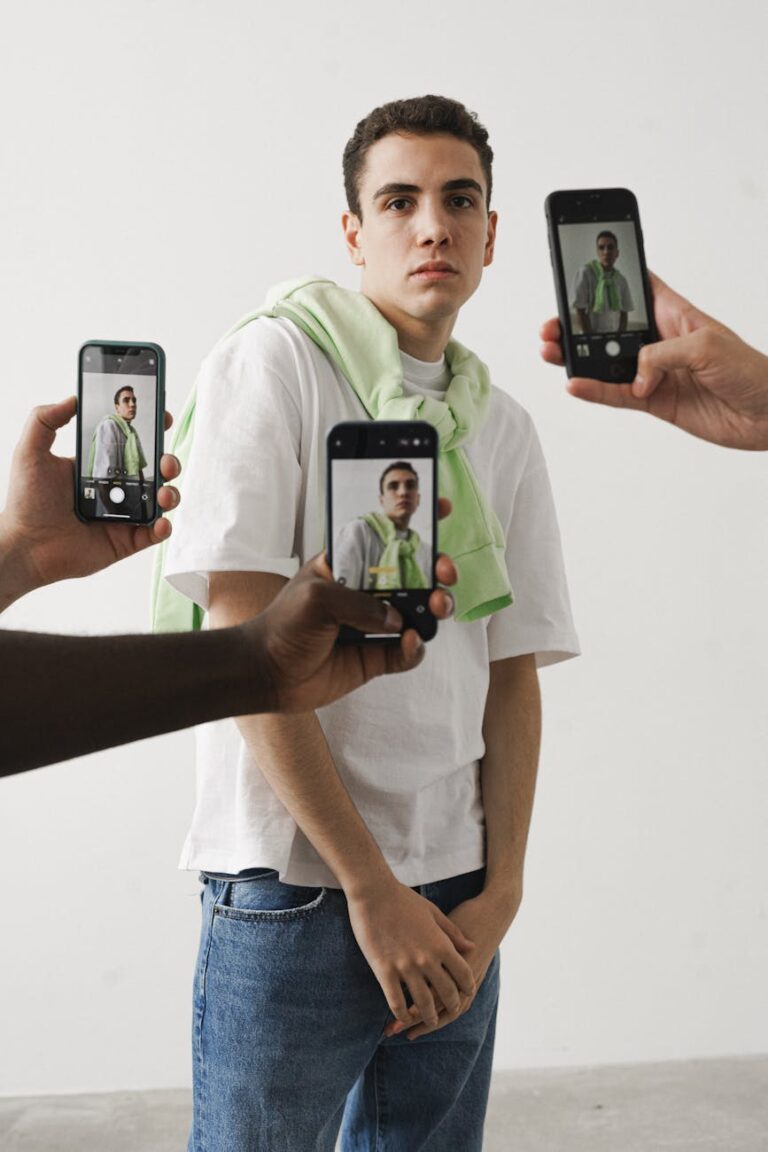 man with green sweater over his should
